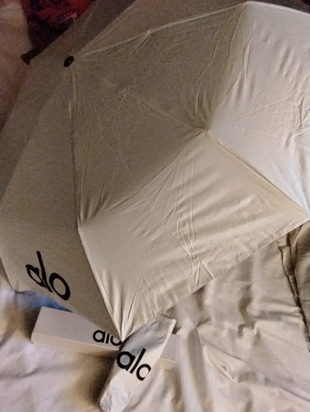 ALO Yoga Cream Umbrella with Black Logo